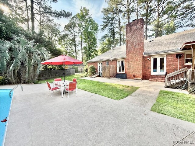 36 Wilkins Rd, Selma, AL 36701 - view of patio featuring french doors and entry steps