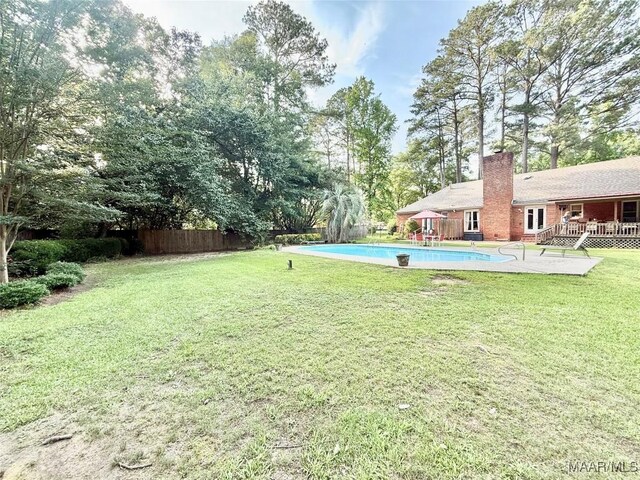 36 Wilkins Rd, Selma, AL 36701 - view of yard with a deck and an outdoor pool