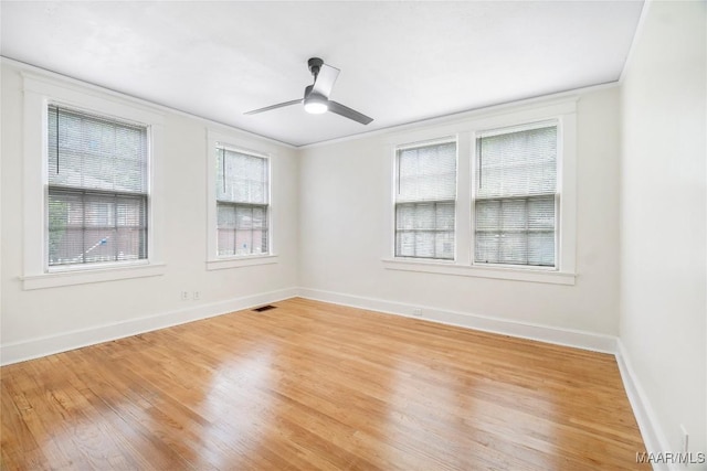 2046 Madison Ave, Montgomery, AL 36107 - empty room with light wood-type flooring, baseboards, ornamental molding, and ceiling fan