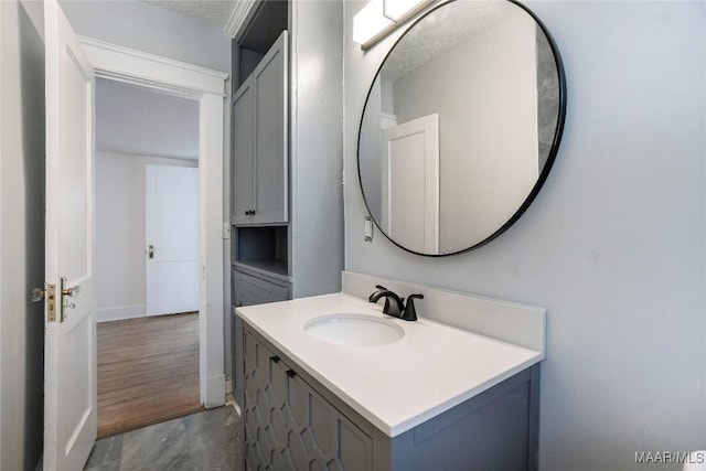 2046 Madison Ave, Montgomery, AL 36107 - bathroom with vanity and a textured ceiling