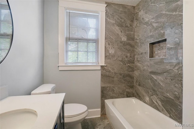 2046 Madison Ave, Montgomery, AL 36107 - bathroom featuring baseboards, vanity, and toilet