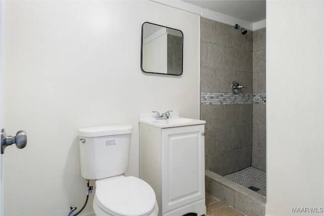 2046 Madison Ave, Montgomery, AL 36107 - bathroom featuring a tile shower, toilet, and vanity