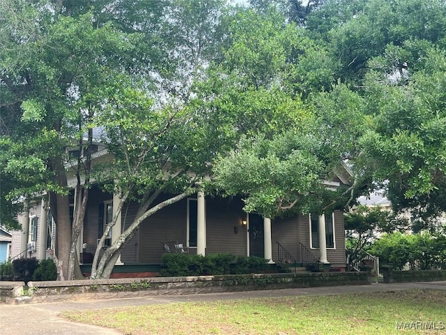 501 Tremont St, Selma, AL 36701 - obstructed view of property featuring covered porch