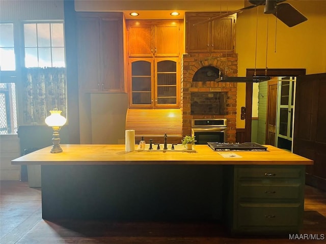 501 Tremont St, Selma, AL 36701 - kitchen featuring appliances with stainless steel finishes, ceiling fan, a sink, light countertops, and healthy amount of natural light