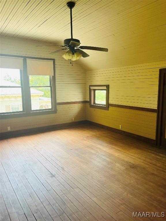 501 Tremont St, Selma, AL 36701 - empty room with a ceiling fan, hardwood / wood-style floors, and wood ceiling