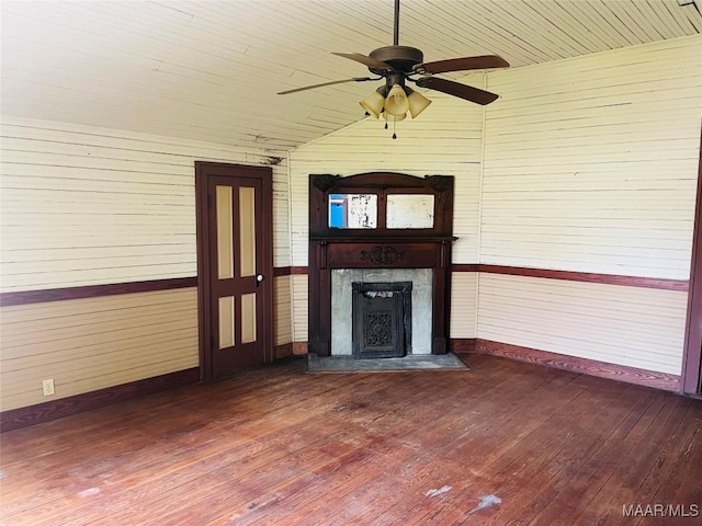 501 Tremont St, Selma, AL 36701 - unfurnished living room featuring baseboards, ceiling fan, wood ceiling, dark wood-type flooring, and a fireplace