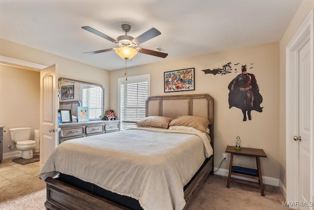 205 Lee Audis Ln, Prattville, AL 36066 - bedroom featuring baseboards, connected bathroom, a ceiling fan, and light colored carpet