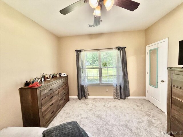 828 Warrior Dr, Valley Grande, AL 36701 - bedroom with carpet floors, baseboards, and a ceiling fan