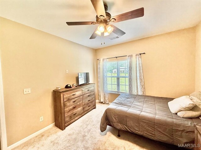 828 Warrior Dr, Valley Grande, AL 36701 - bedroom featuring light colored carpet, baseboards, and ceiling fan