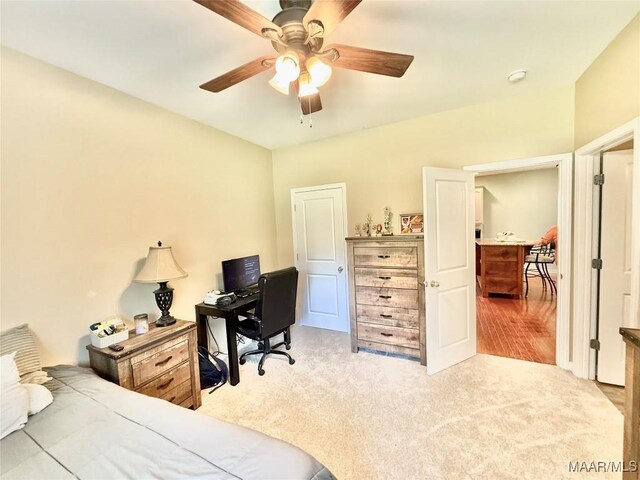 828 Warrior Dr, Valley Grande, AL 36701 - bedroom with carpet floors, a desk, and a ceiling fan