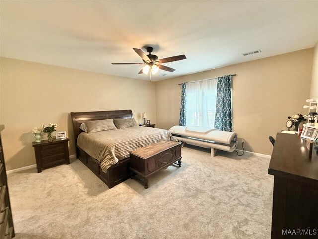 828 Warrior Dr, Valley Grande, AL 36701 - carpeted bedroom with baseboards and ceiling fan