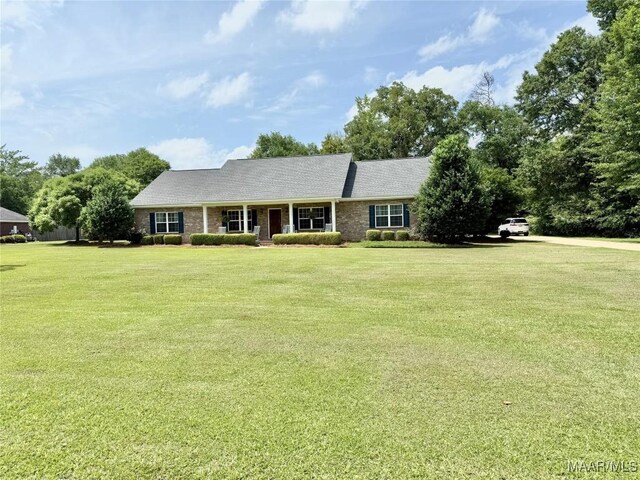 828 Warrior Dr, Valley Grande, AL 36701 - single story home with a front yard