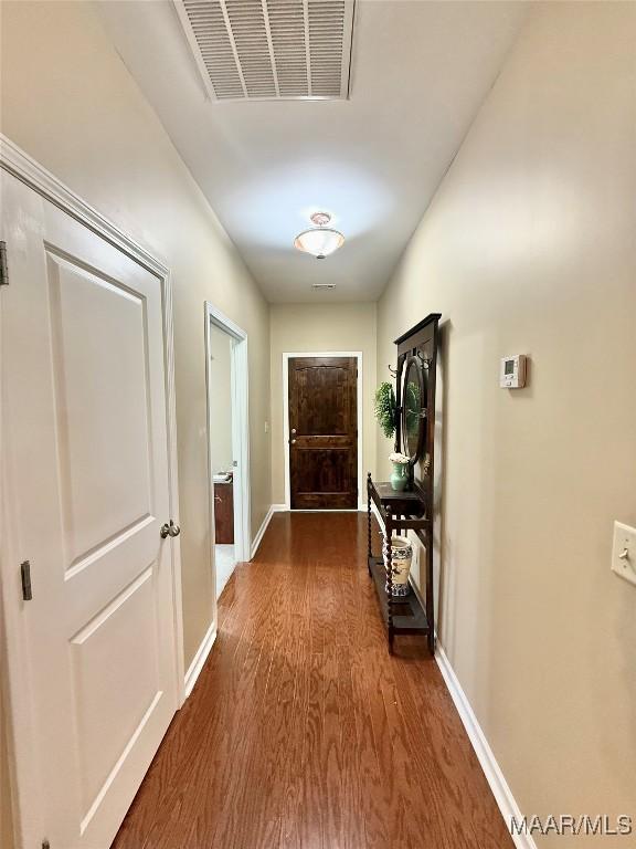 828 Warrior Dr, Valley Grande, AL 36701 - hallway featuring wood finished floors and baseboards