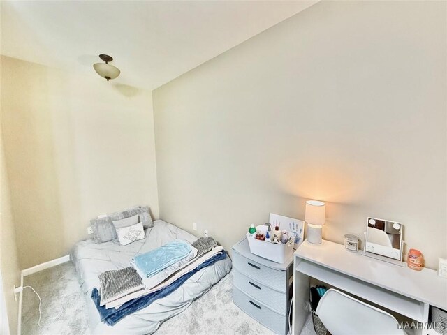 828 Warrior Dr, Valley Grande, AL 36701 - carpeted bedroom with a desk and baseboards