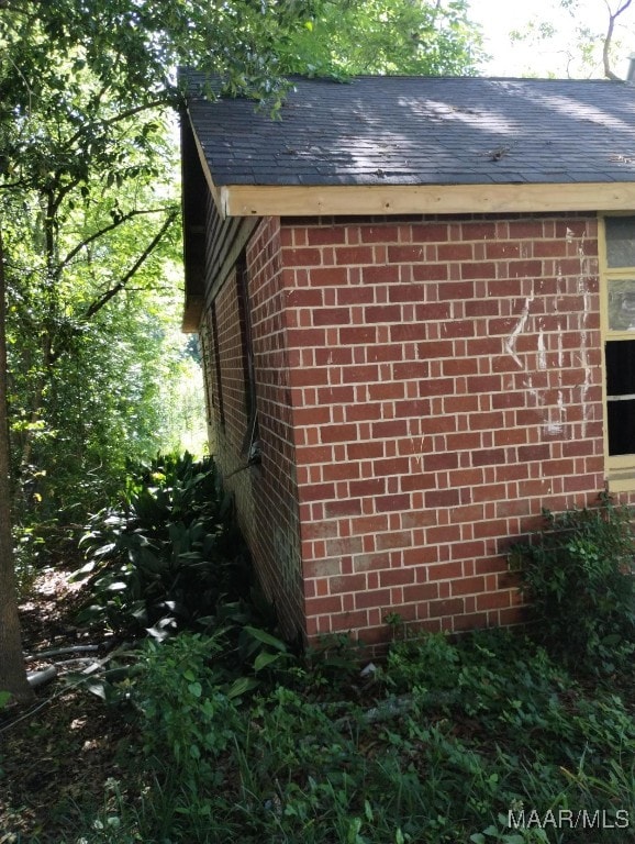 1010 12th Ave, Phenix City, AL 36867 - exterior view of brick siding and a shingled roof
