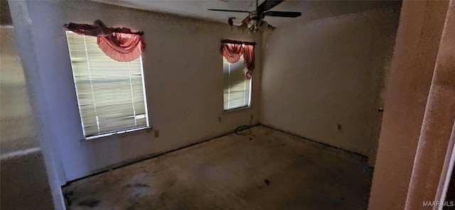 5743 Belleau Dr, Montgomery, AL 36117 - empty room featuring ceiling fan and unfinished concrete flooring