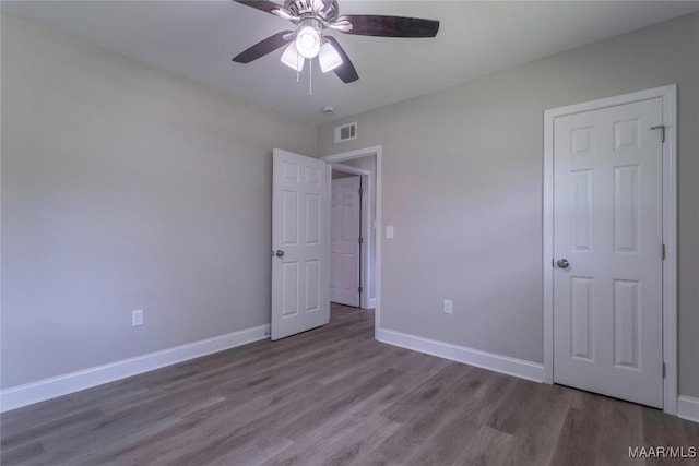 3468 Biltmore Ave, Montgomery, AL 36109 - unfurnished bedroom featuring wood finished floors, baseboards, and ceiling fan
