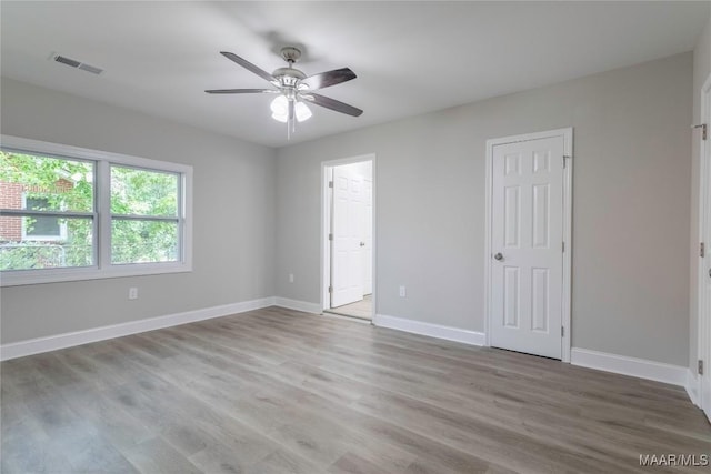 3468 Biltmore Ave, Montgomery, AL 36109 - unfurnished bedroom with baseboards, wood finished floors, and a ceiling fan