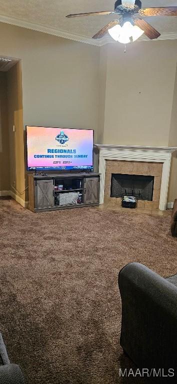 6200 Sycamore Dr, Montgomery, AL 36117 - carpeted living room with a fireplace, crown molding, and a ceiling fan