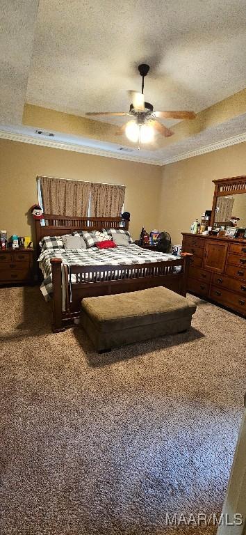 6200 Sycamore Dr, Montgomery, AL 36117 - carpeted bedroom with a textured ceiling, ornamental molding, and ceiling fan
