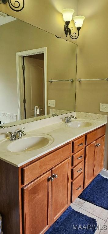 6200 Sycamore Dr, Montgomery, AL 36117 - full bathroom featuring double vanity and tile patterned floors