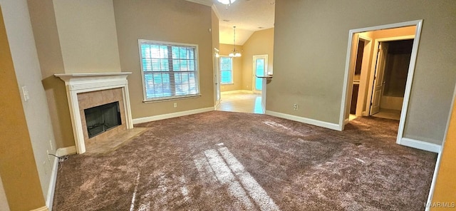 6200 Sycamore Dr, Montgomery, AL 36117 - unfurnished living room featuring a chandelier, carpet floors, a fireplace, and vaulted ceiling
