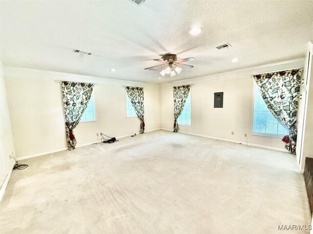441 County Road 401, Selma, AL 36701 - unfurnished room with plenty of natural light, light carpet, recessed lighting, a textured ceiling, and crown molding