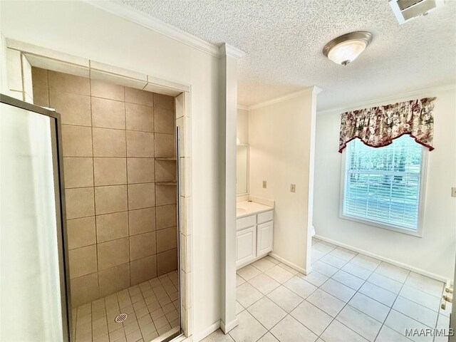441 County Road 401, Selma, AL 36701 - bathroom with tile patterned flooring, a shower stall, ornamental molding, a textured ceiling, and vanity