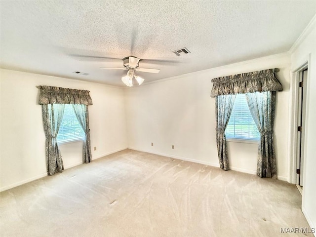 441 County Road 401, Selma, AL 36701 - carpeted spare room featuring ceiling fan, a textured ceiling, baseboards, and ornamental molding