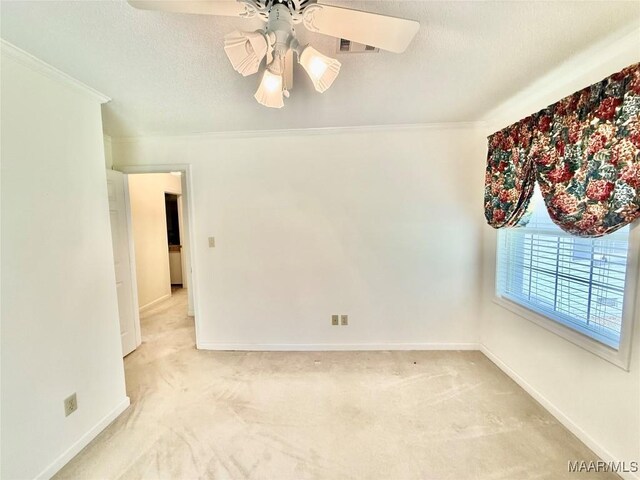 441 County Road 401, Selma, AL 36701 - unfurnished room featuring light colored carpet, ornamental molding, ceiling fan, baseboards, and a textured ceiling