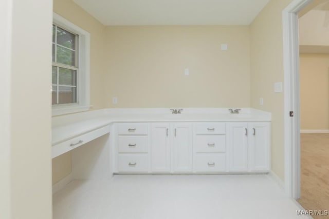929 Ironwood Dr, Montgomery, AL 36117 - unfurnished office with a sink, baseboards, and light carpet