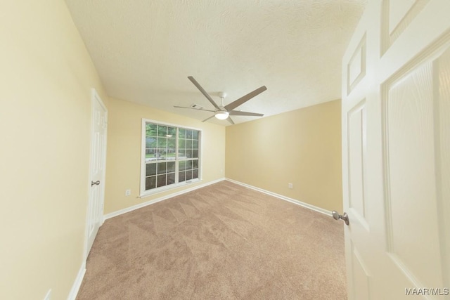 929 Ironwood Dr, Montgomery, AL 36117 - spare room with ceiling fan, carpet, baseboards, a textured ceiling, and lofted ceiling