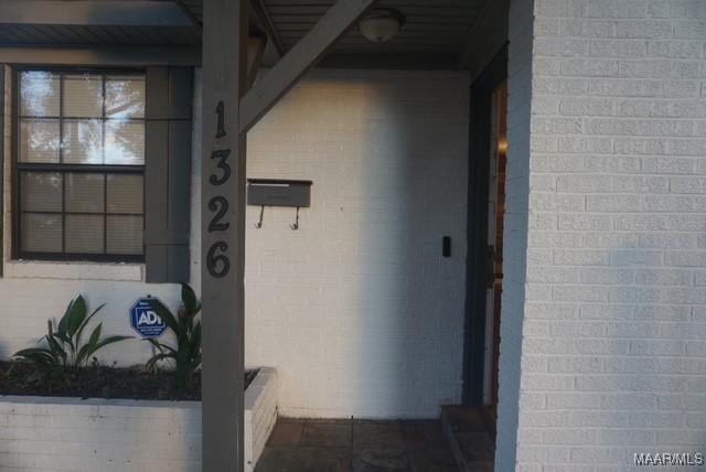 1324-1326 Federal Dr, Montgomery, AL 36107 - entrance to property with brick siding