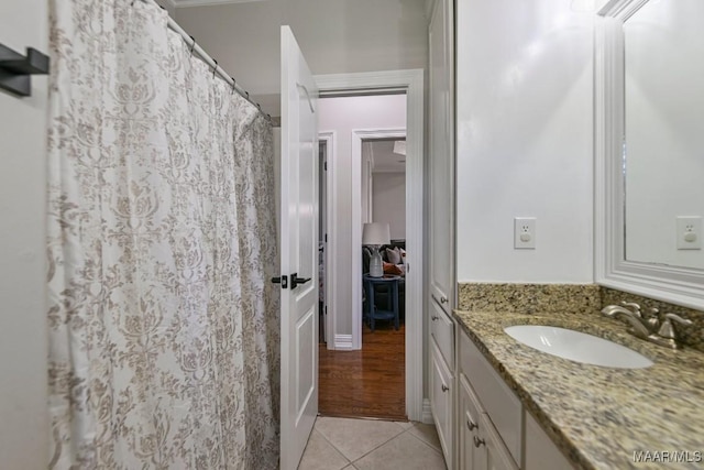 541 Jasmine Trl, Prattville, AL 36066 - full bath featuring vanity, tile patterned floors, and a shower with shower curtain
