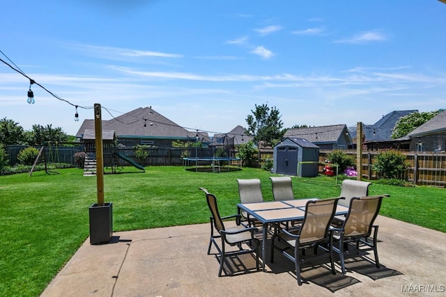 541 Jasmine Trl, Prattville, AL 36066 - view of patio featuring a playground, outdoor dining space, and a trampoline