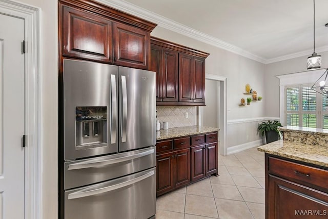 541 Jasmine Trl, Prattville, AL 36066 - kitchen with stainless steel fridge, decorative light fixtures, light tile patterned floors, tasteful backsplash, and crown molding