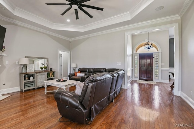 541 Jasmine Trl, Prattville, AL 36066 - living area with a ceiling fan, hardwood / wood-style flooring, a tray ceiling, baseboards, and crown molding