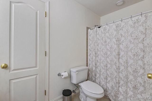 541 Jasmine Trl, Prattville, AL 36066 - full bath featuring toilet, curtained shower, and tile patterned floors