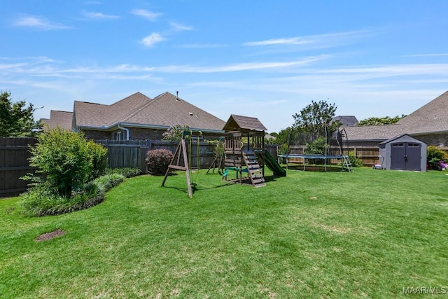 541 Jasmine Trl, Prattville, AL 36066 - view of yard with a trampoline and a playground