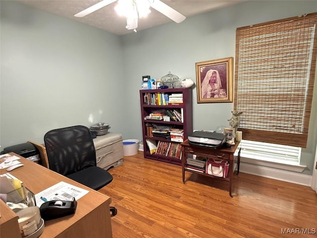 40 Larkspur Ln, Millbrook, AL 36054 - office area featuring light wood finished floors, a ceiling fan, and baseboards