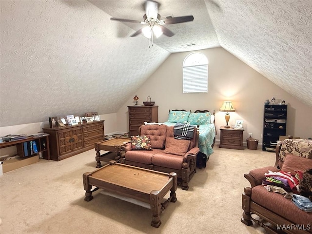 40 Larkspur Ln, Millbrook, AL 36054 - carpeted bedroom featuring a textured ceiling, vaulted ceiling, and ceiling fan