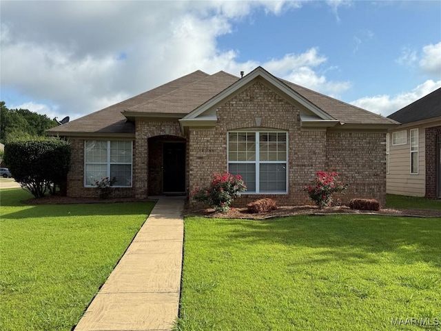3701 Claiborne Cir, Montgomery, AL 36116 - view of front of property featuring brick siding, a front lawn, and roof with shingles