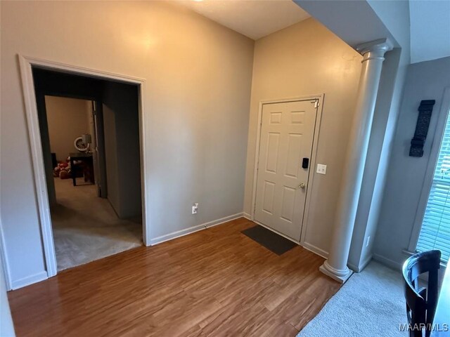 3701 Claiborne Cir, Montgomery, AL 36116 - foyer with wood finished floors, ornate columns, and baseboards