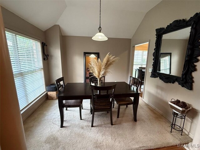 3701 Claiborne Cir, Montgomery, AL 36116 - carpeted dining room featuring lofted ceiling and baseboards