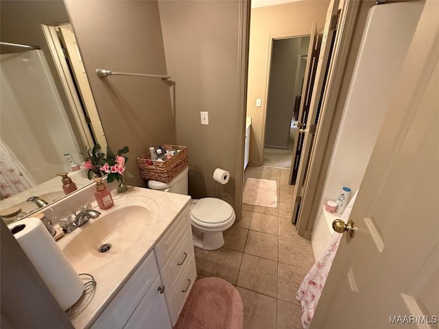 3701 Claiborne Cir, Montgomery, AL 36116 - full bath featuring vanity, toilet, and tile patterned floors