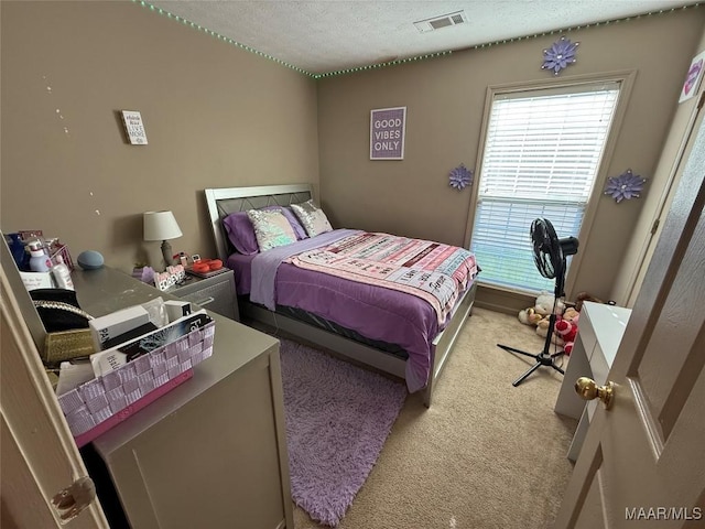 3701 Claiborne Cir, Montgomery, AL 36116 - carpeted bedroom with a textured ceiling