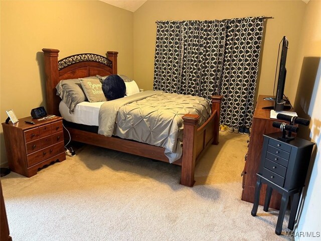 3701 Claiborne Cir, Montgomery, AL 36116 - bedroom with vaulted ceiling and light colored carpet