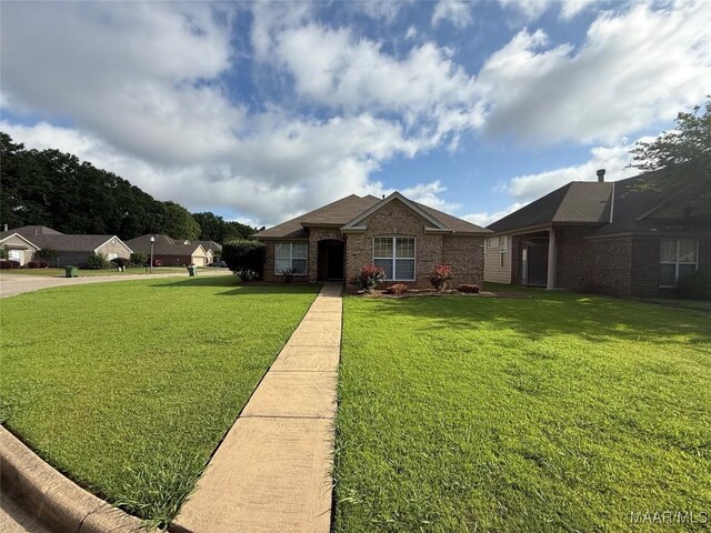 3701 Claiborne Cir, Montgomery, AL 36116 - ranch-style house with brick siding and a front yard