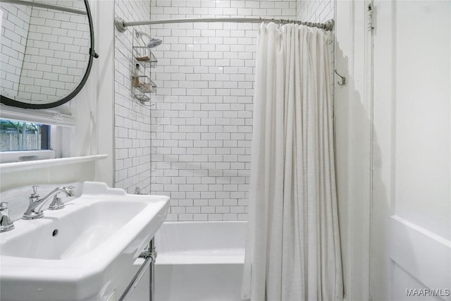 3328 Lebron Rd, Montgomery, AL 36106 - full bath featuring shower / bath combination with curtain and a sink
