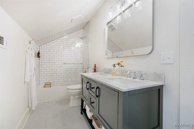 3328 Lebron Rd, Montgomery, AL 36106 - bathroom featuring double vanity, toilet, and shower / bath combination